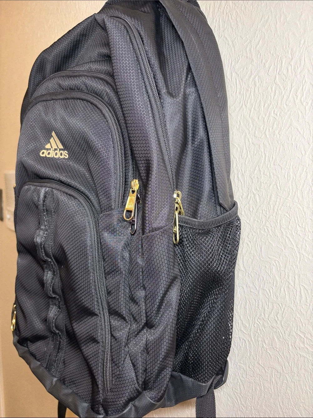 adidas Black Backpack with Gold Logo & Zipper Accents